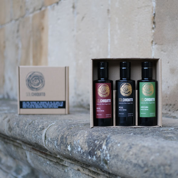 Gift-box with three early harvest extra virgin olive oil bottles of picual royal and arbequina varieties