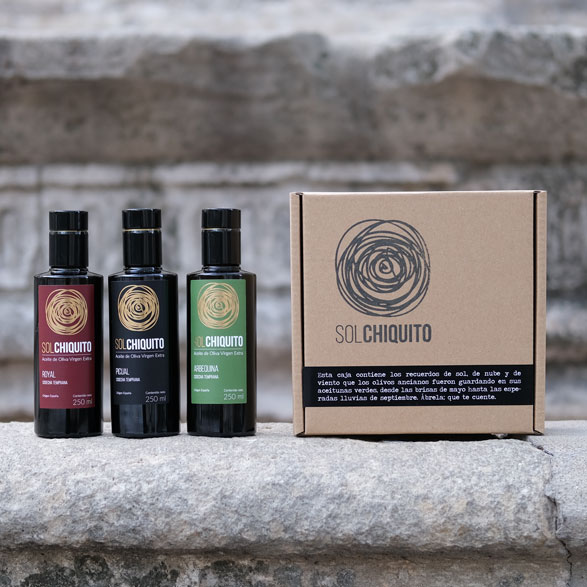 Gift-box with three early harvest extra virgin olive oil bottles of picual royal and arbequina varieties